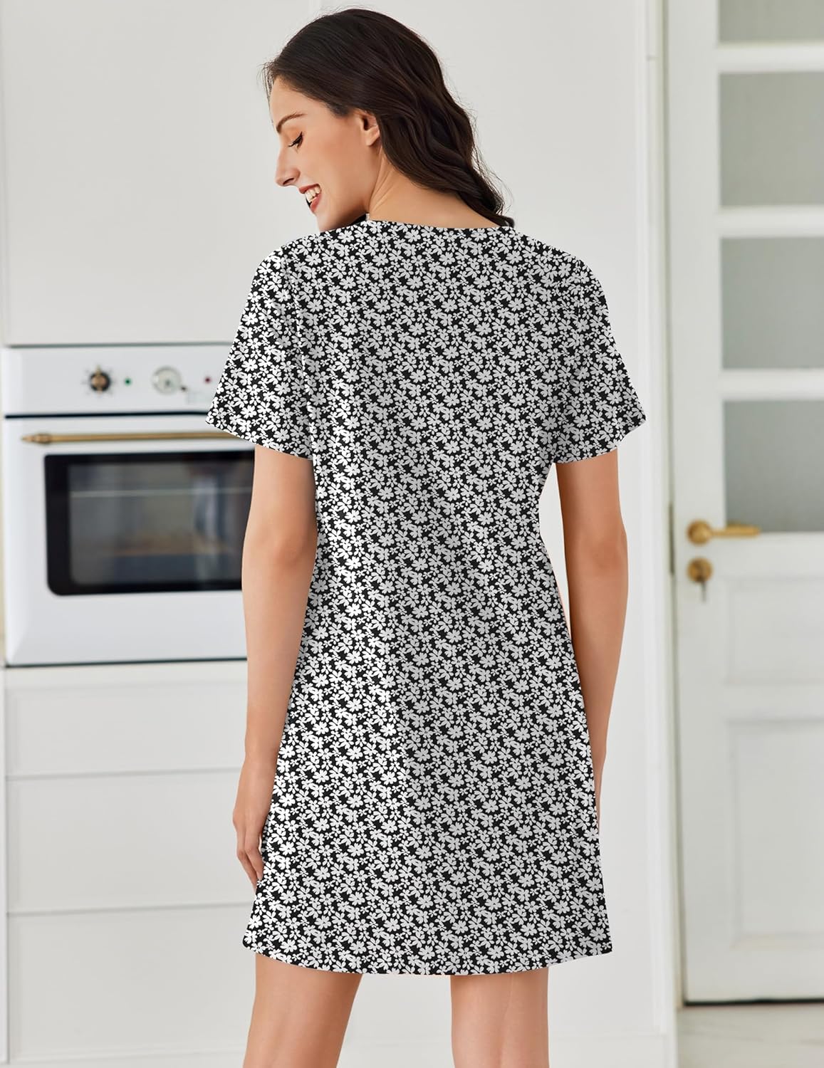 Cotton nightgown back view, short sleeves, black with white floral print