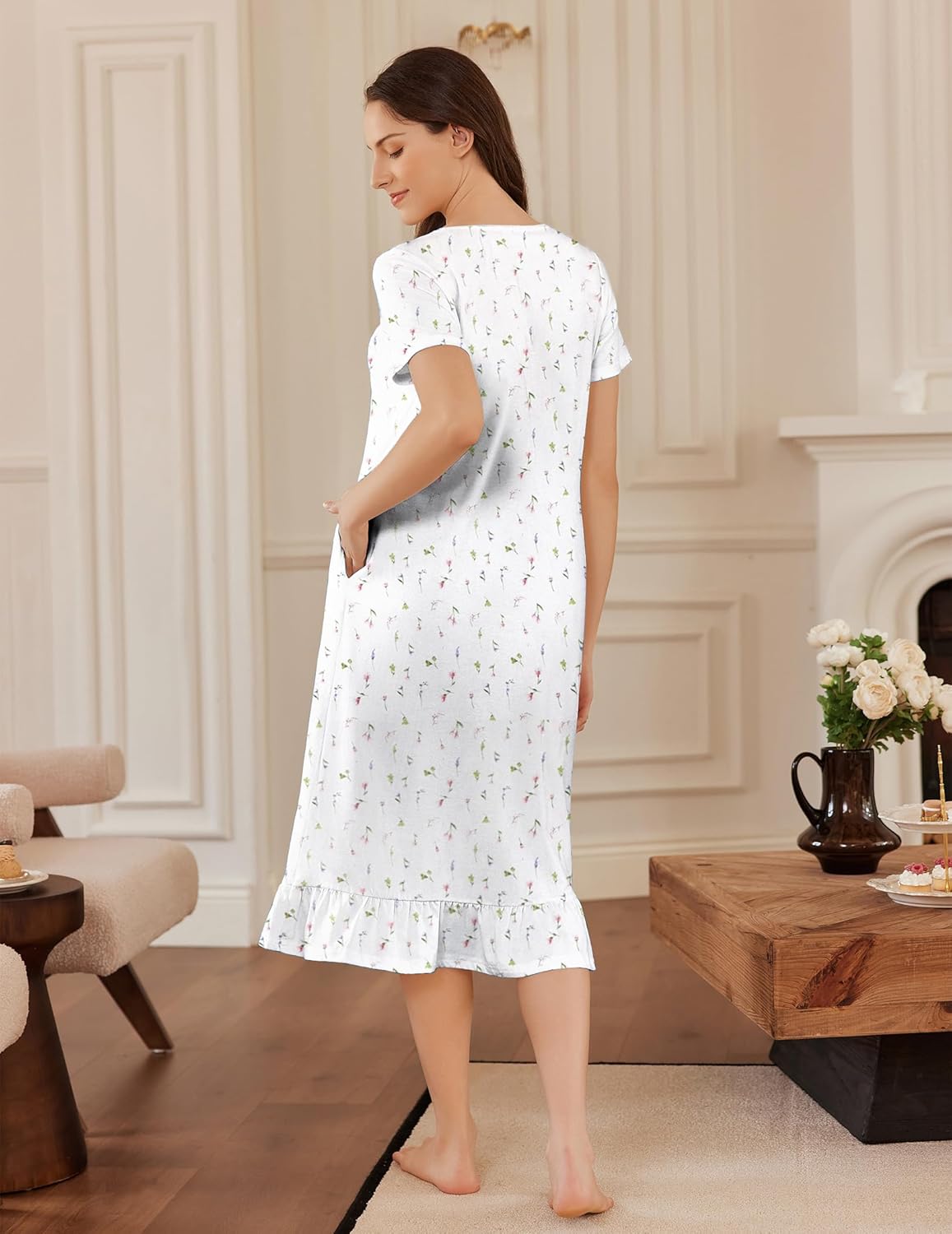 White cotton nightgown back view, short sleeves, delicate floral print, ruffled hem