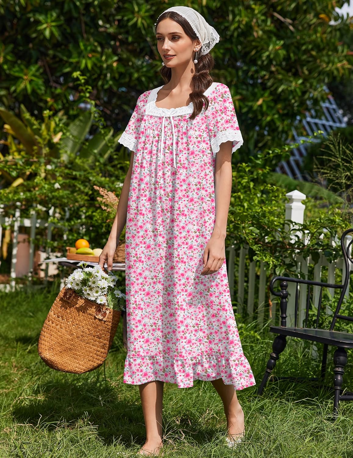 Cotton nightdress in light pink floral with lace-trimmed neckline, short sleeves, midi length