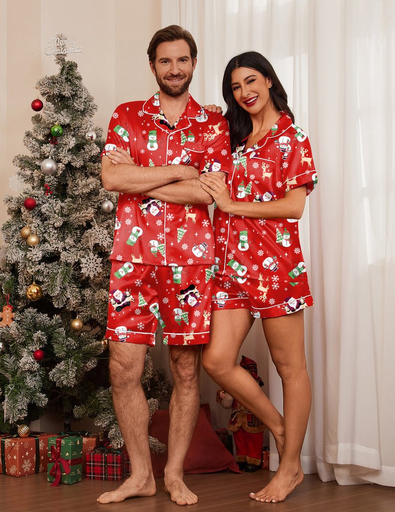 Red Christmas pajama set for couples with gingerbread prints; short-sleeve shirts and shorts.