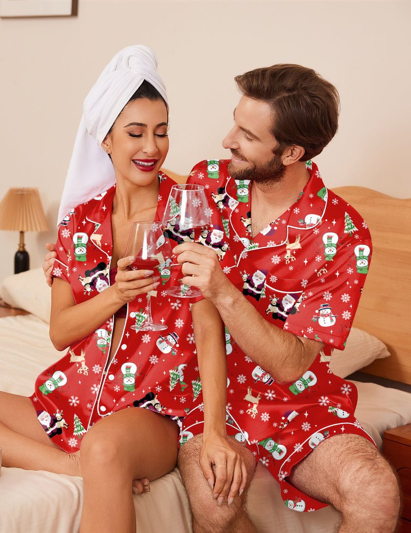 Red festive pajama set with snowman and gingerbread motifs; short-sleeve button top and shorts.
