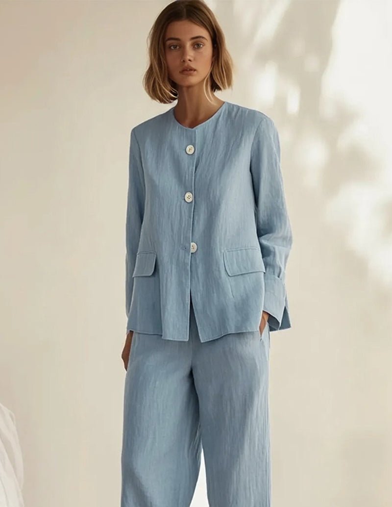 Blue cotton sleepwear set with button jacket, two side pockets, and wide-leg pants