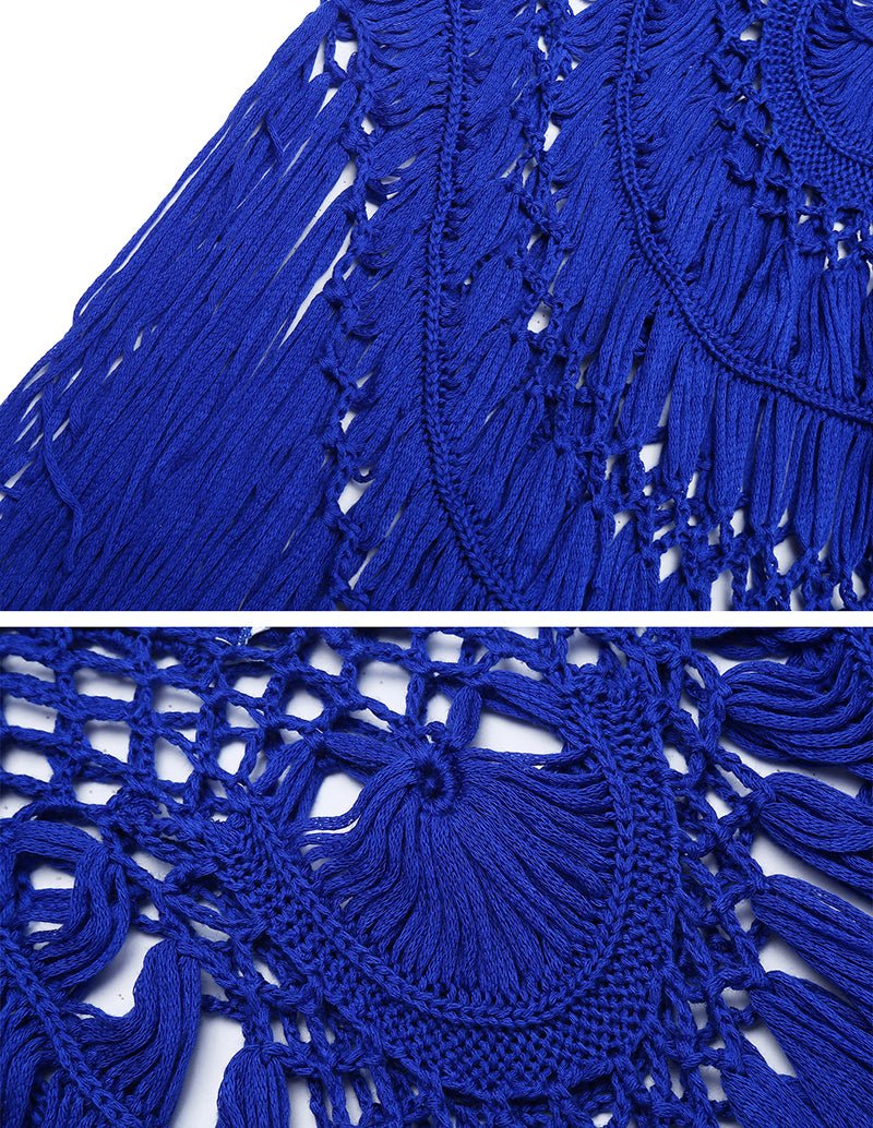 Blue crochet openwork close-up with scalloped texture and long fringe strands