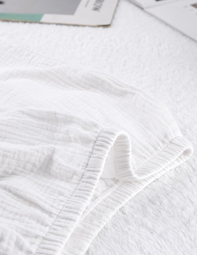 White cotton pajama shorts waistband and stitched seam detail