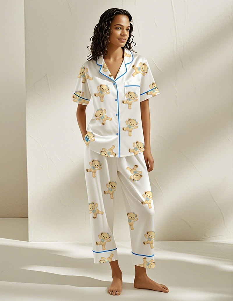 White teddy bear pajama set, button-front shirt and matching pants with bear print