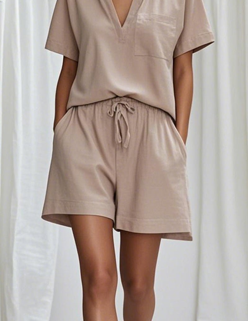 Khaki pajama set close-up: tie-waist shorts and matching polo top
