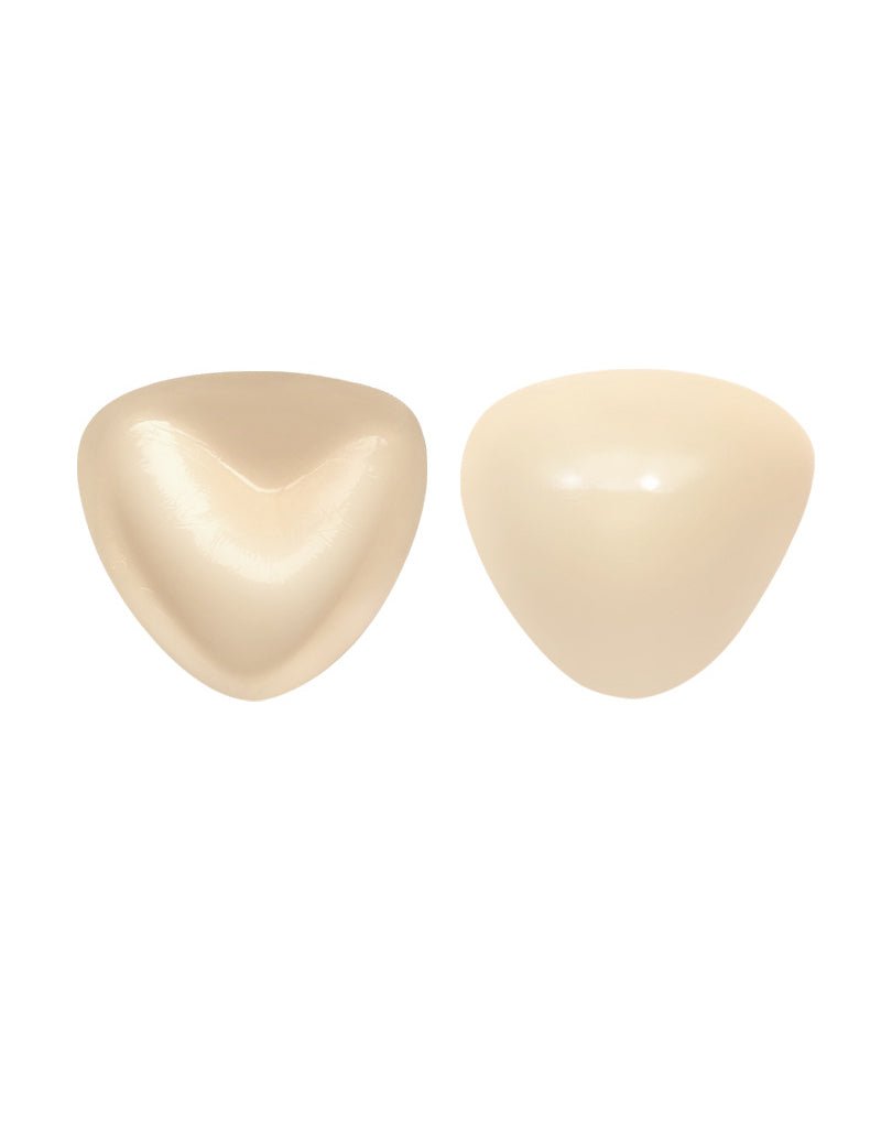 Self-adhesive chest pad pair, glossy light beige triangular cups.