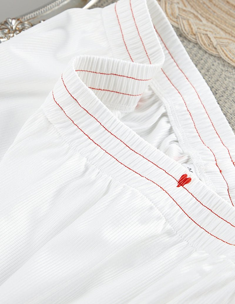 White lounge set top with red heart embroidery and striped trim neckline