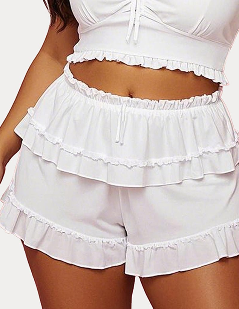 White cotton ruffled tiered shorts with elastic waistband and drawstring