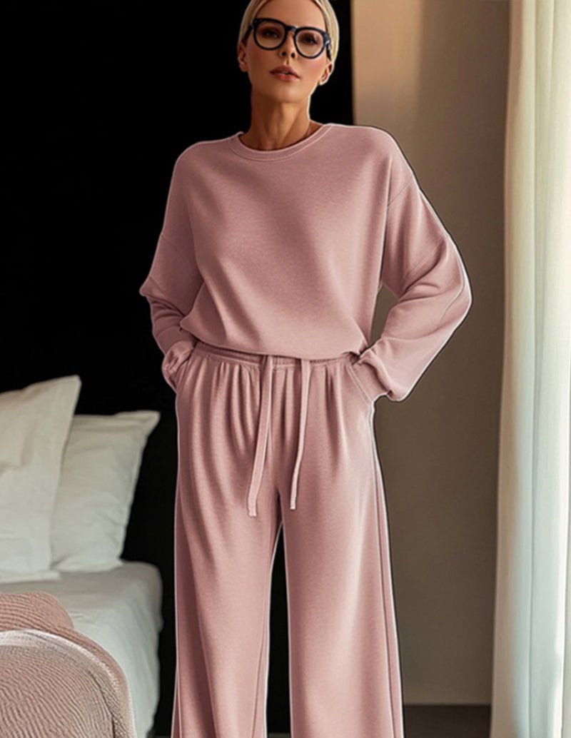 Pink lounge set with crewneck long-sleeve top and drawstring wide-leg pants