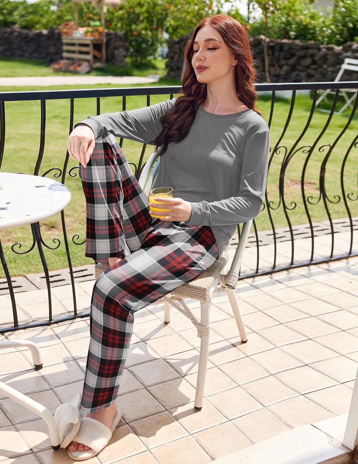 Long-sleeve pajama set with gray top and red/white/black plaid drawstring pants