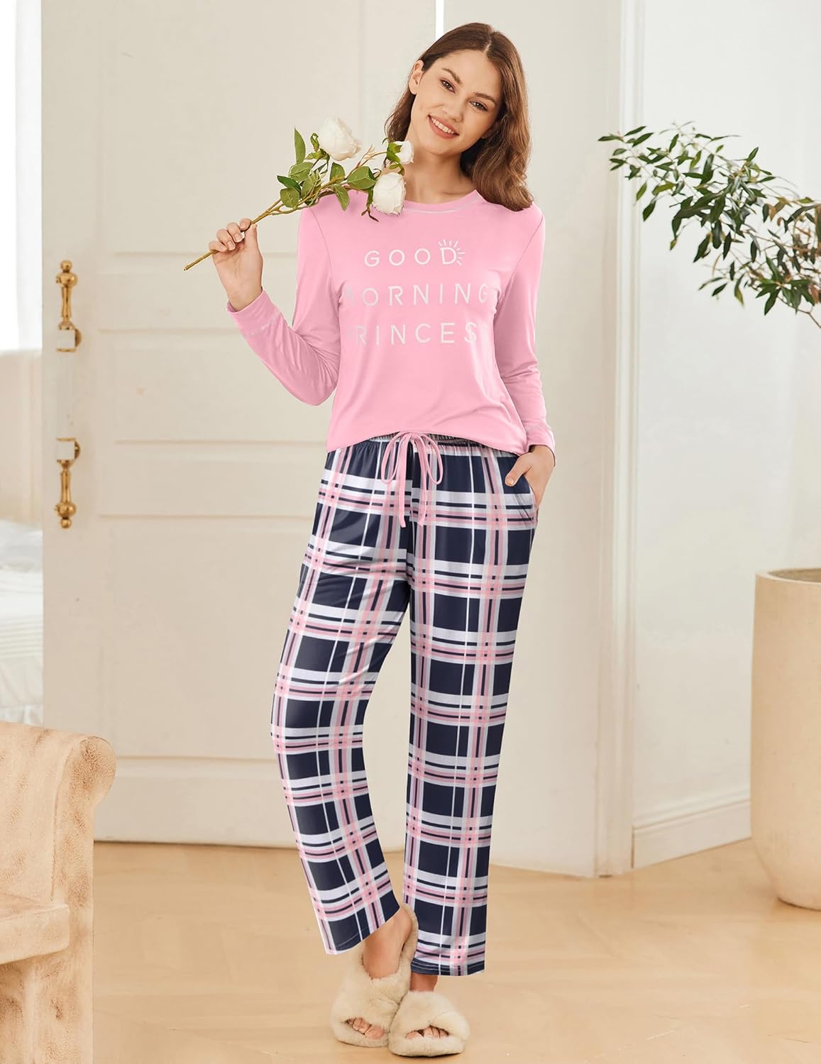 Pink long-sleeve pajama set with navy, white, and pink plaid drawstring pants