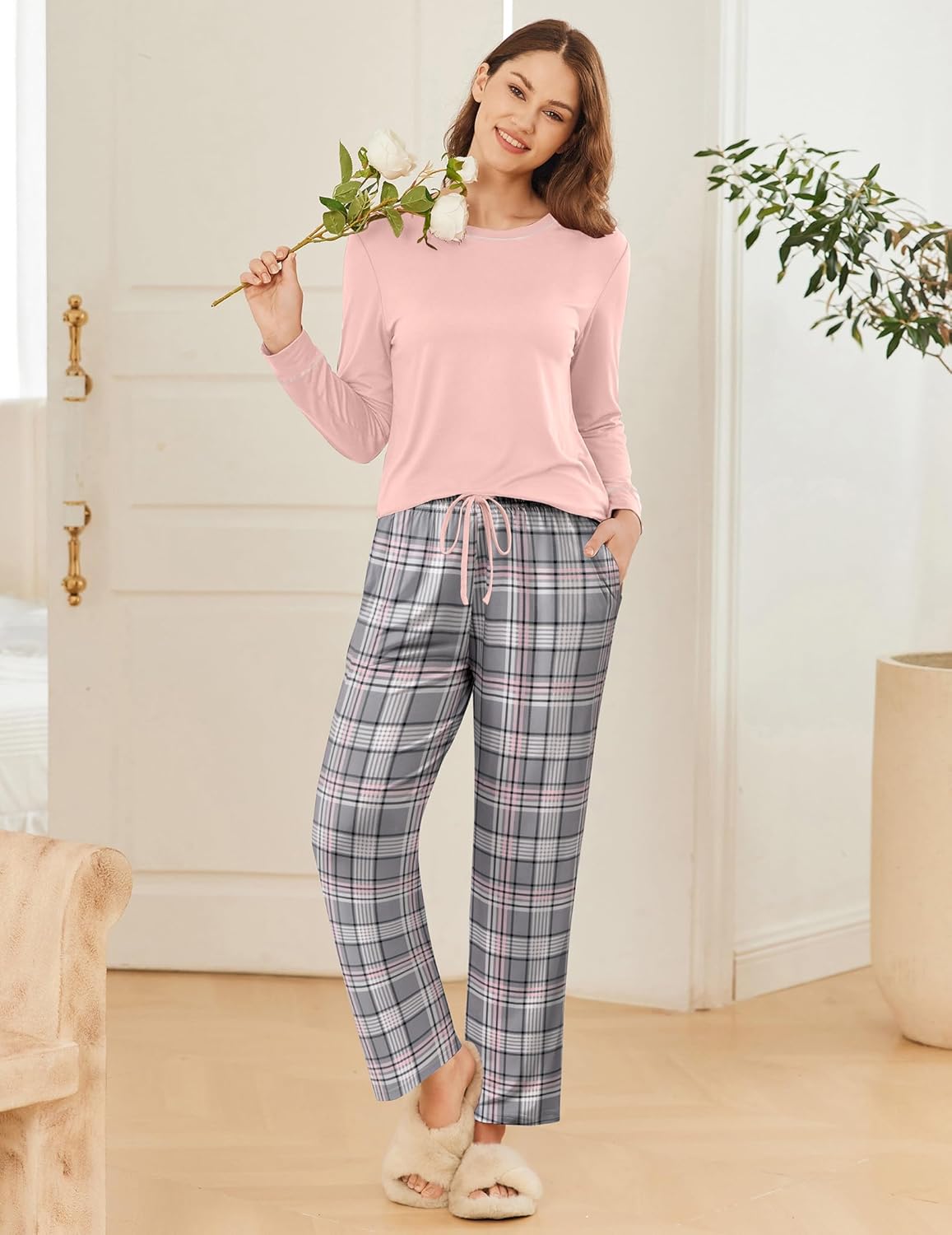 Light pink long-sleeve pajama top with gray plaid drawstring pants.