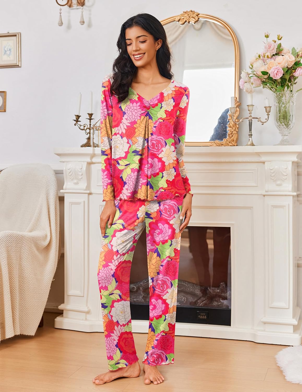 Women’s long-sleeve pajama set with bright pink rose floral print and matching pants.