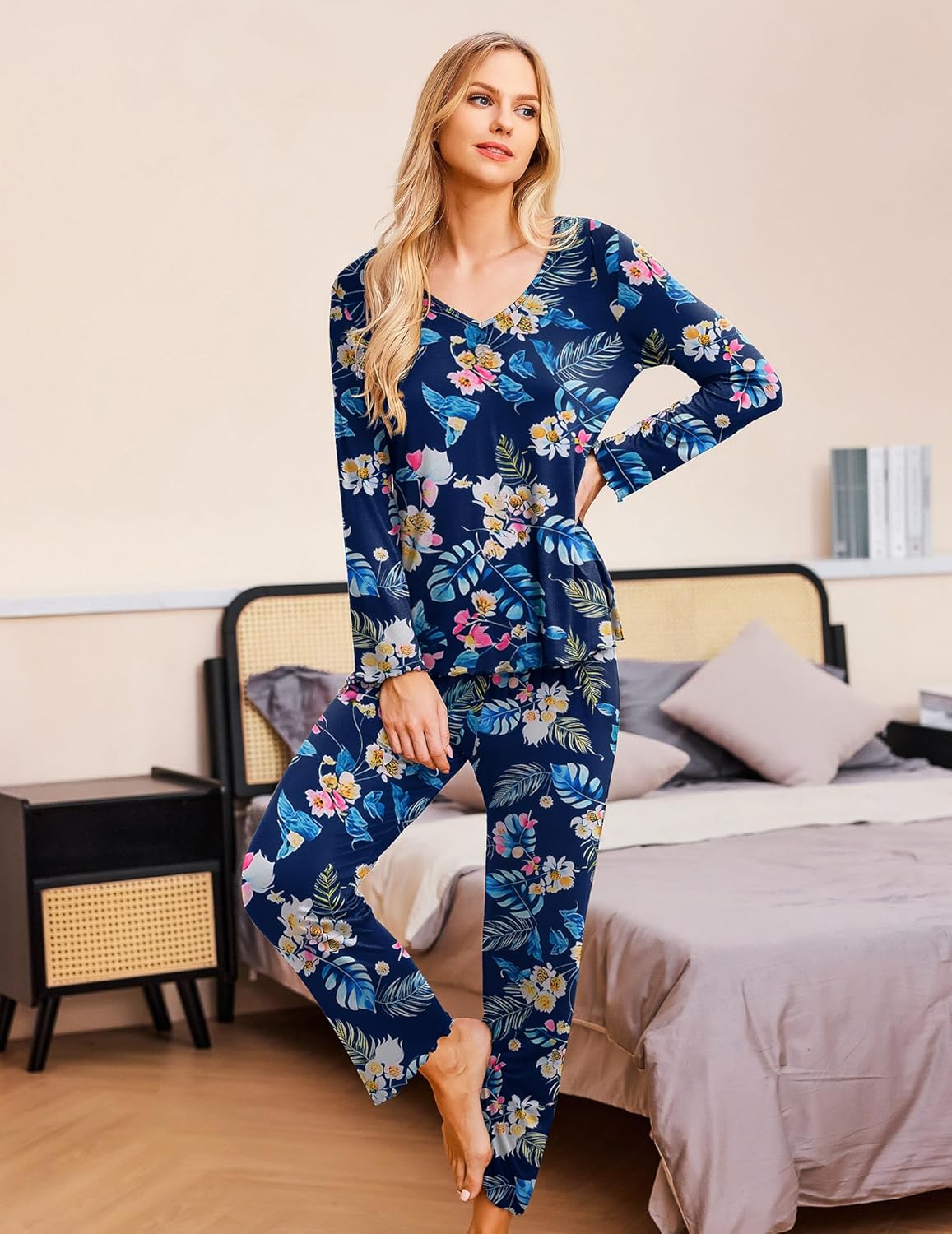 Women’s long-sleeve pajama set in navy with blue floral print, relaxed pants