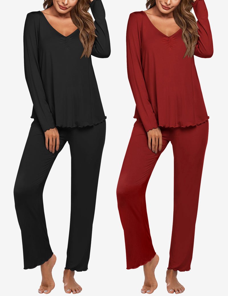 Two women’s long-sleeve pajama sets: black and deep red V-neck tops with matching pants