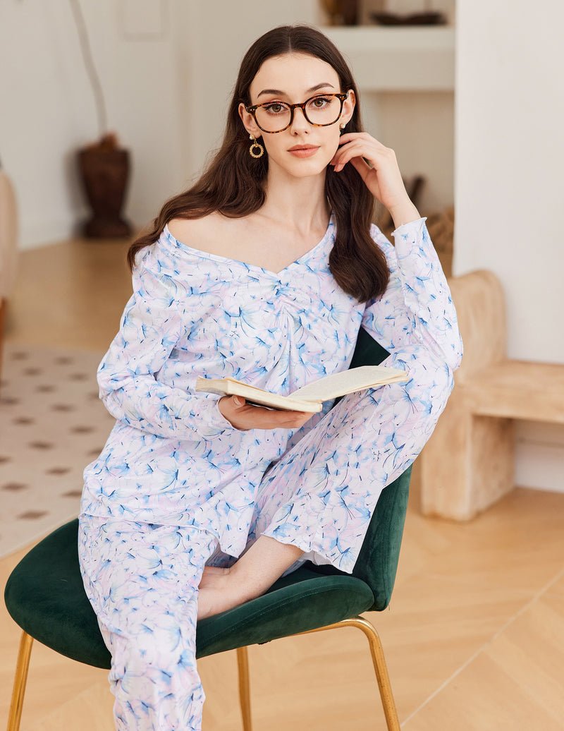 Floral long-sleeve V-neck pajama set with ruched neckline and matching relaxed pants in light blue