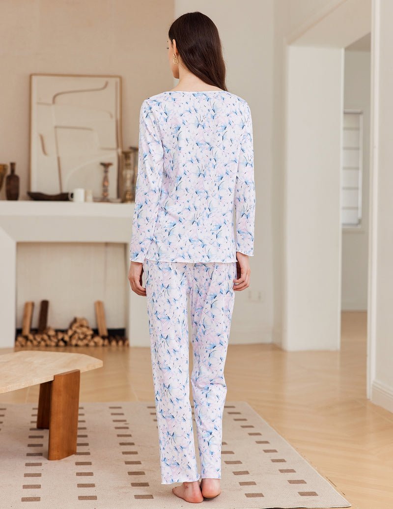 Floral long-sleeve pajama set with V-neck top and matching relaxed pants in light blue