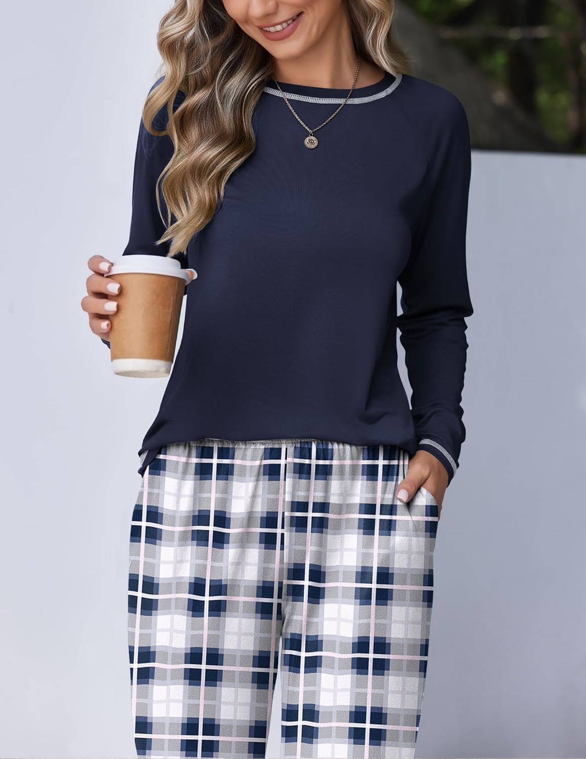 Navy long-sleeve pajama set with blue-and-white plaid pants
