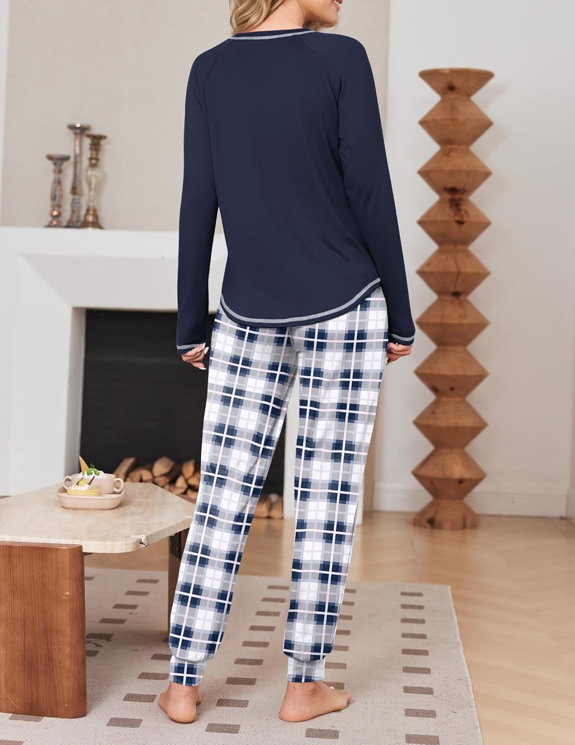 Navy long-sleeve pajama top with blue-and-white plaid pants