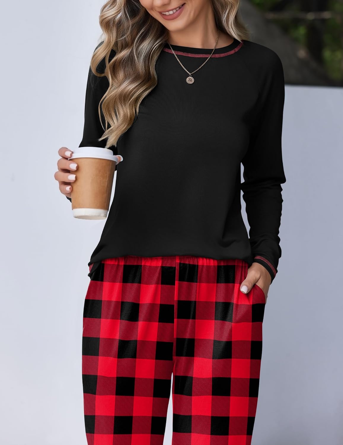 Black long-sleeve pajama top with red-and-black plaid lounge pants