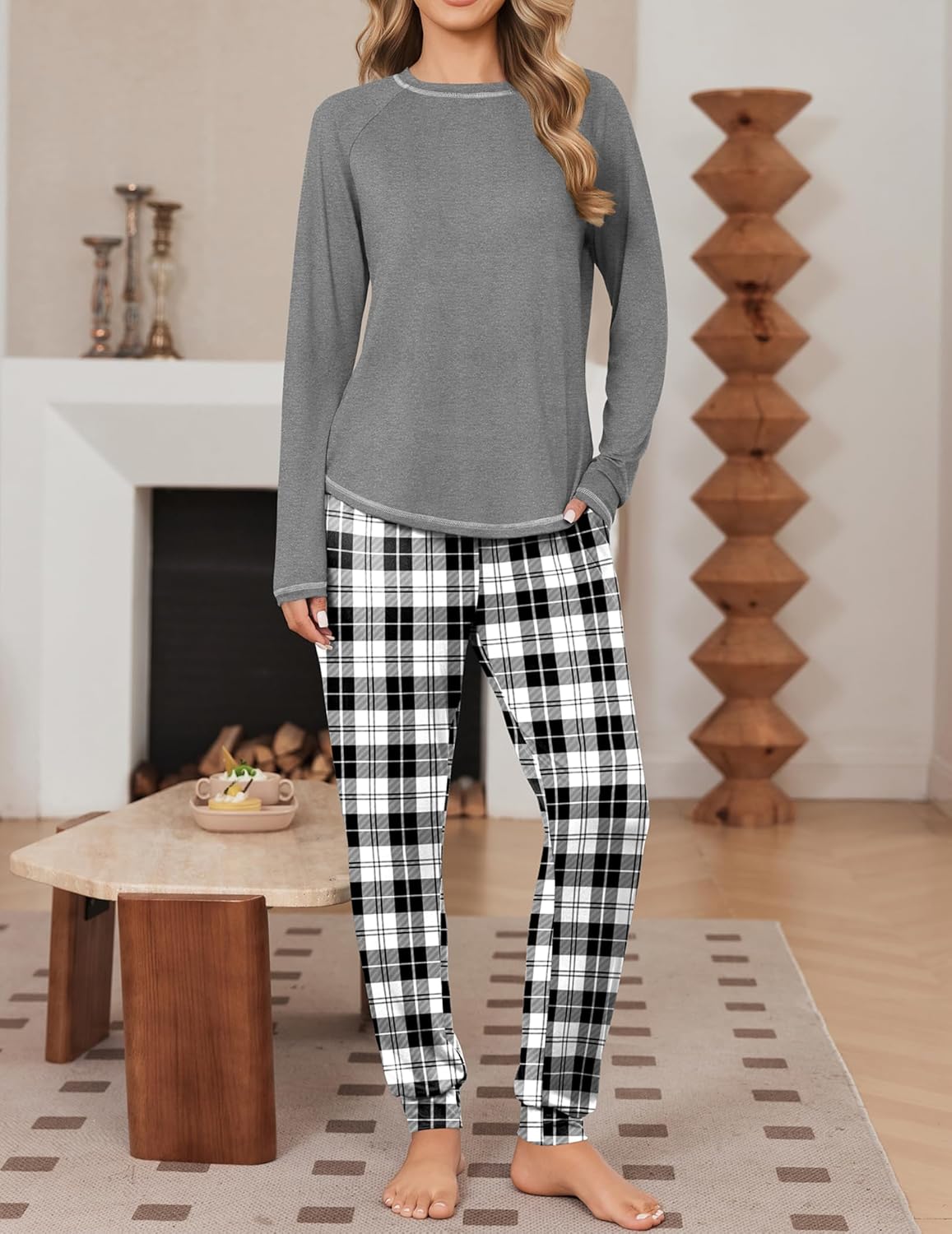 Grey long-sleeve pajama top with black-and-white plaid pants, drawstring joggers