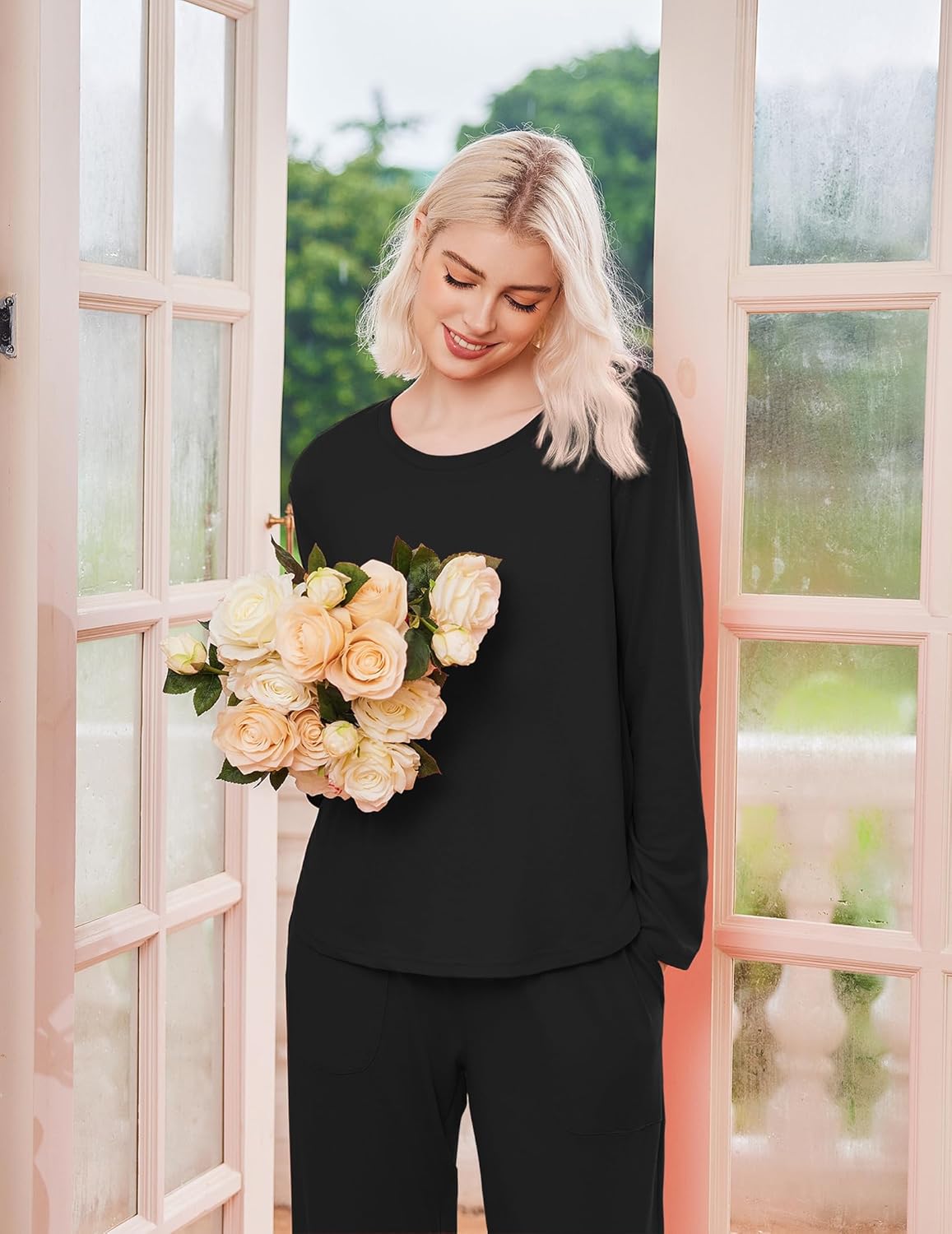 Black long-sleeve pajama set with matching pants, crew neckline and relaxed fit
