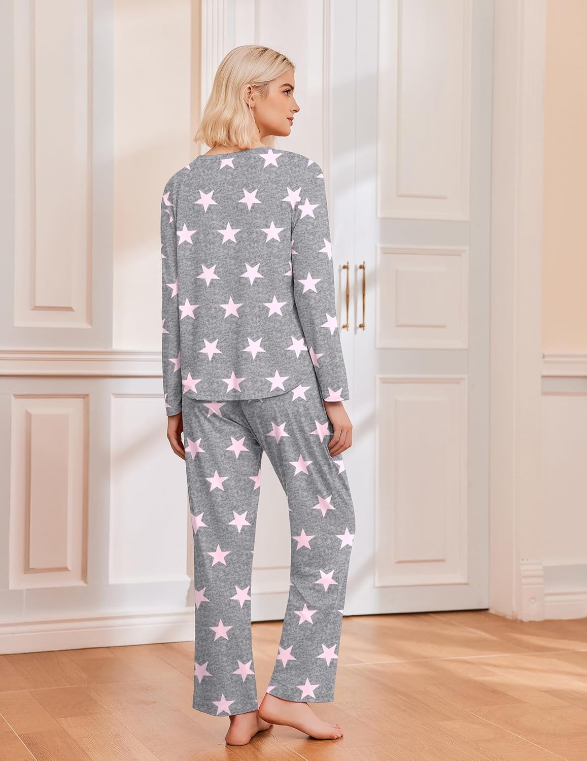 Light grey pajama set with pink star print, long sleeves and matching pants