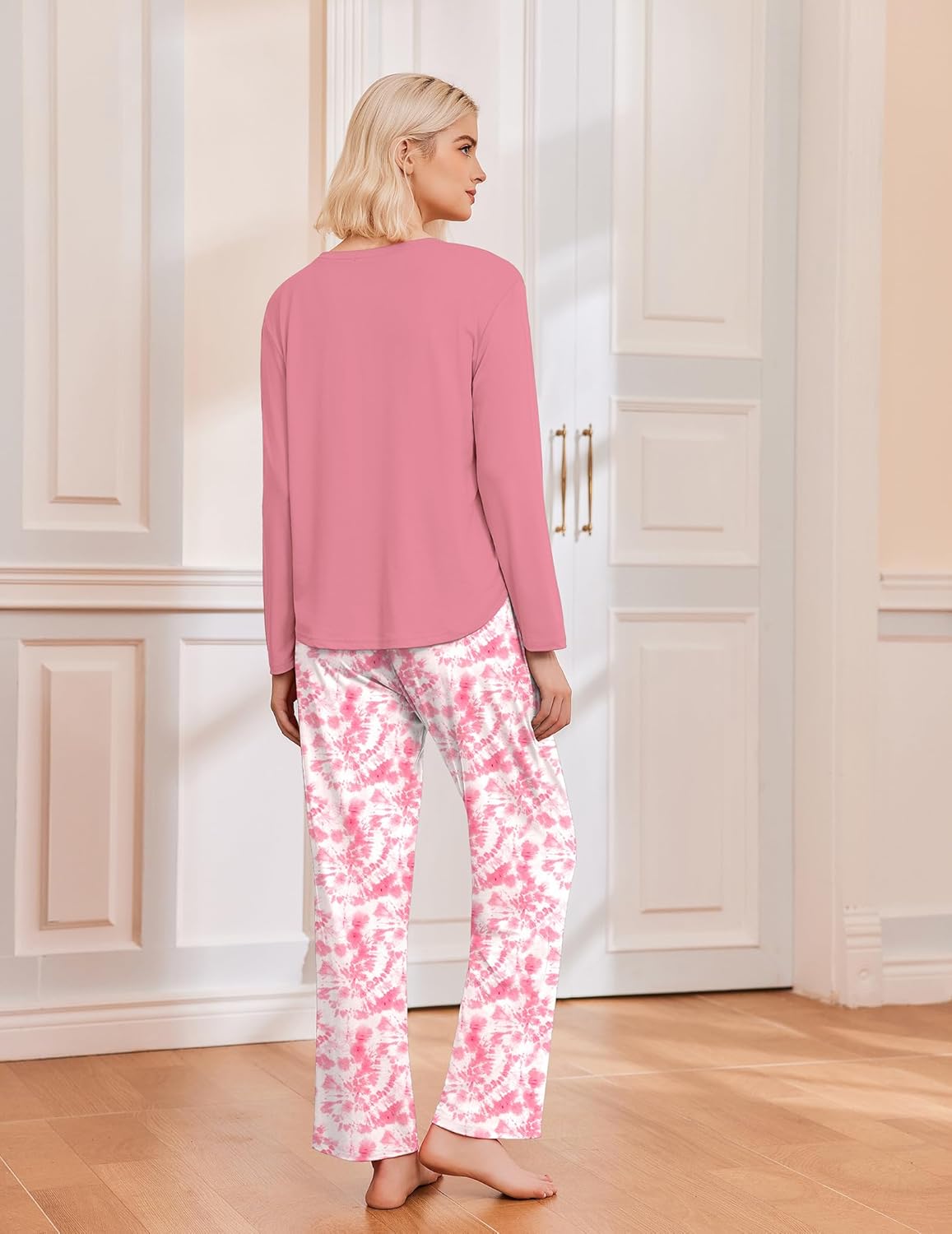 Pink long-sleeve pajama top with pink floral print pajama pants, back view