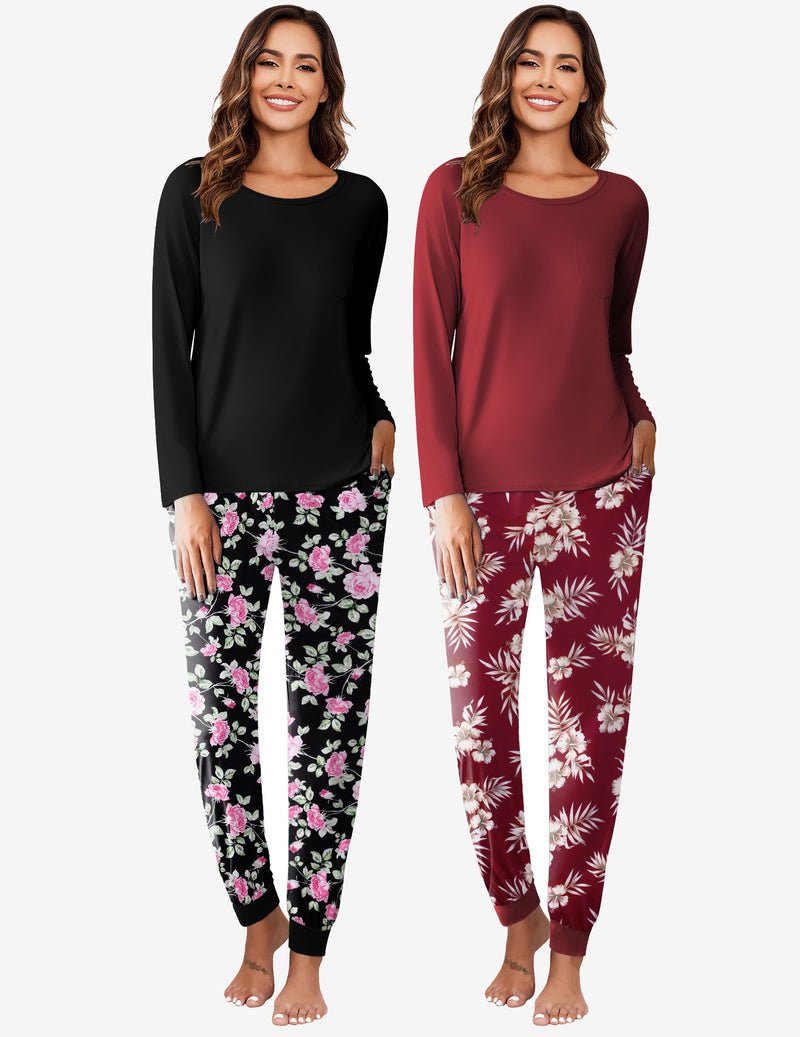 2-teiliger Pyjama: schwarzes Oberteil, schwarze Hose mit bunten Blumen