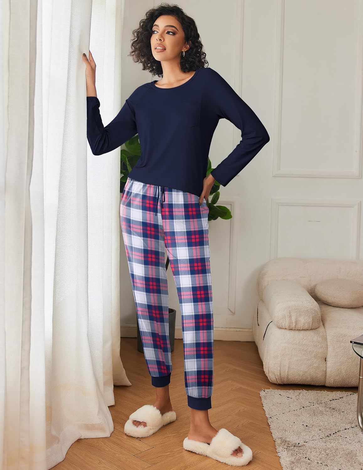 Navy long-sleeve pajama top with red, white, and blue plaid lounge pants