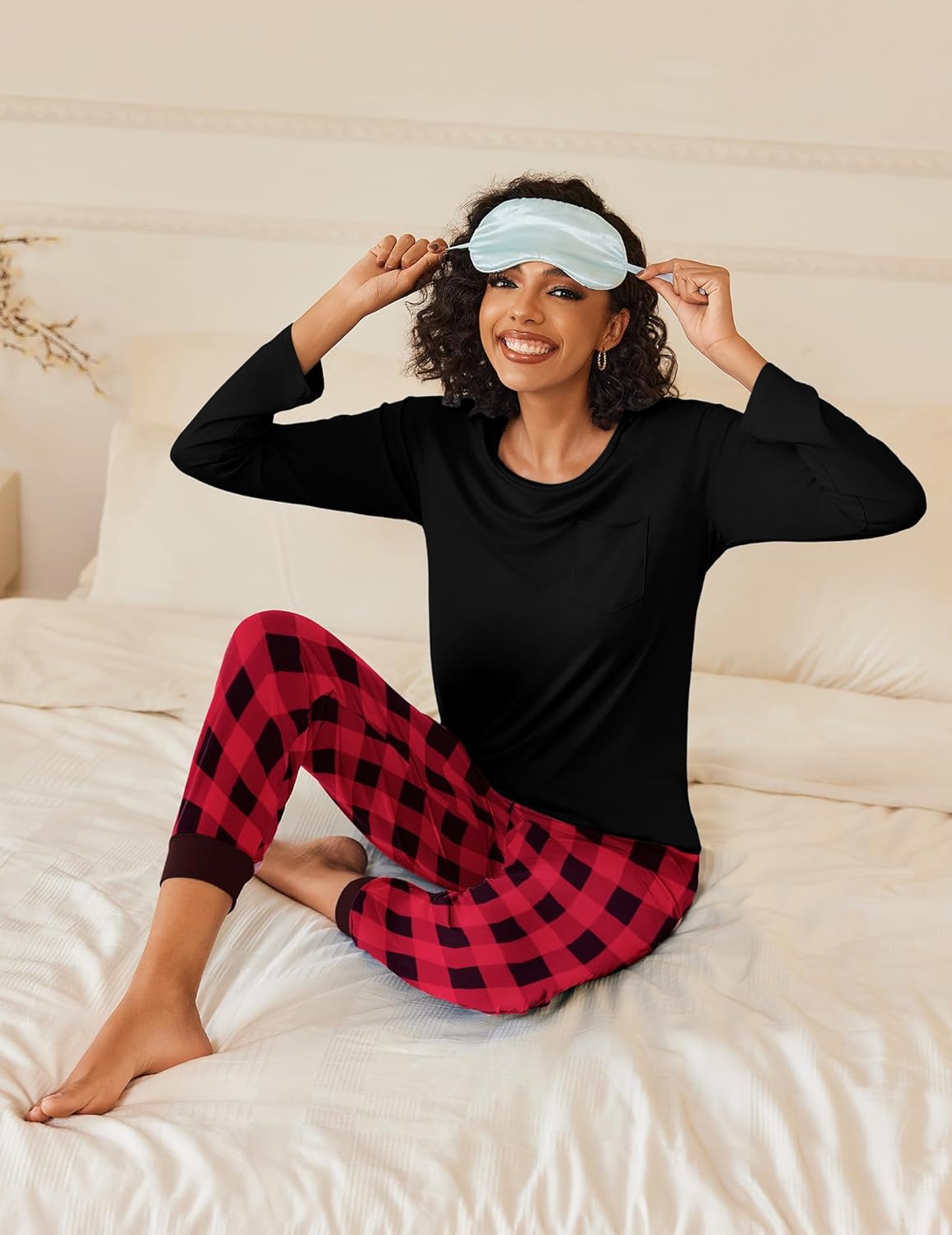 Black long-sleeve pajama top with red and black plaid lounge pants
