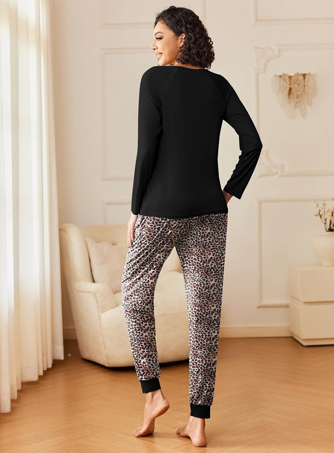 Long-sleeve pajama set: black top with leopard-print pants