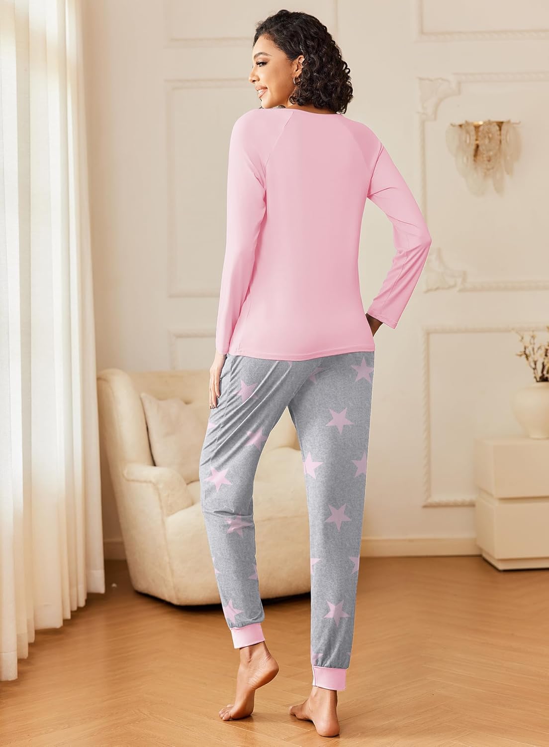 Light pink long-sleeve pajama top with gray lounge pants and pink star print