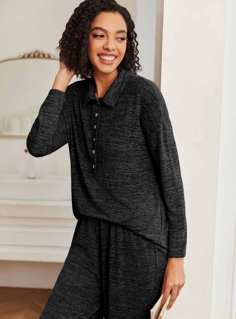 Dark gray knit pajama set with button-up collar, long sleeves, and matching pants