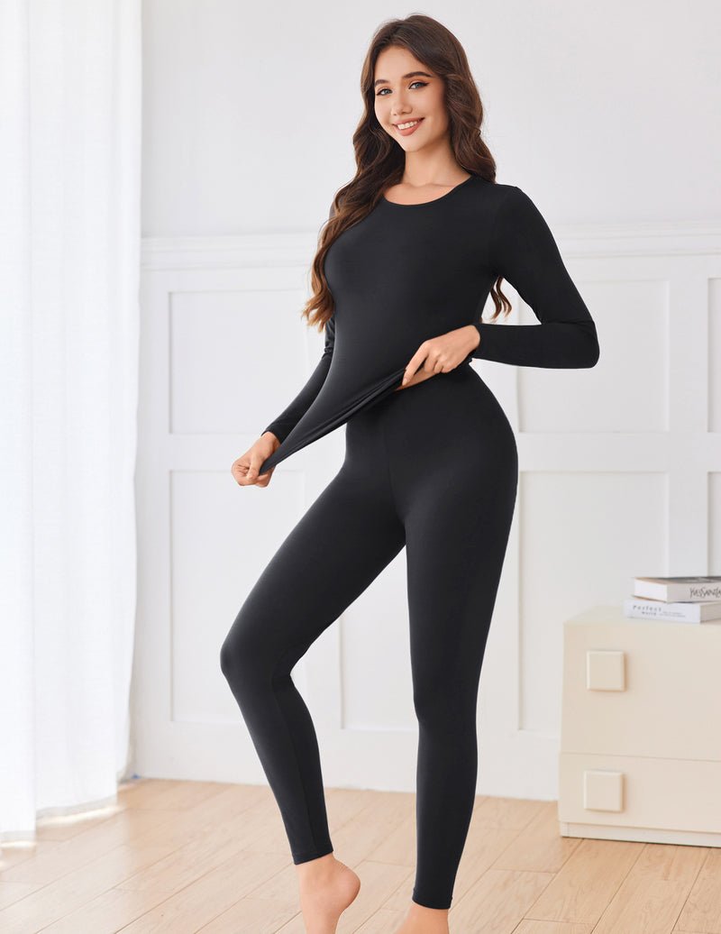 Black thermal set with long-sleeve top and full-length leggings, fitted stretch fabric