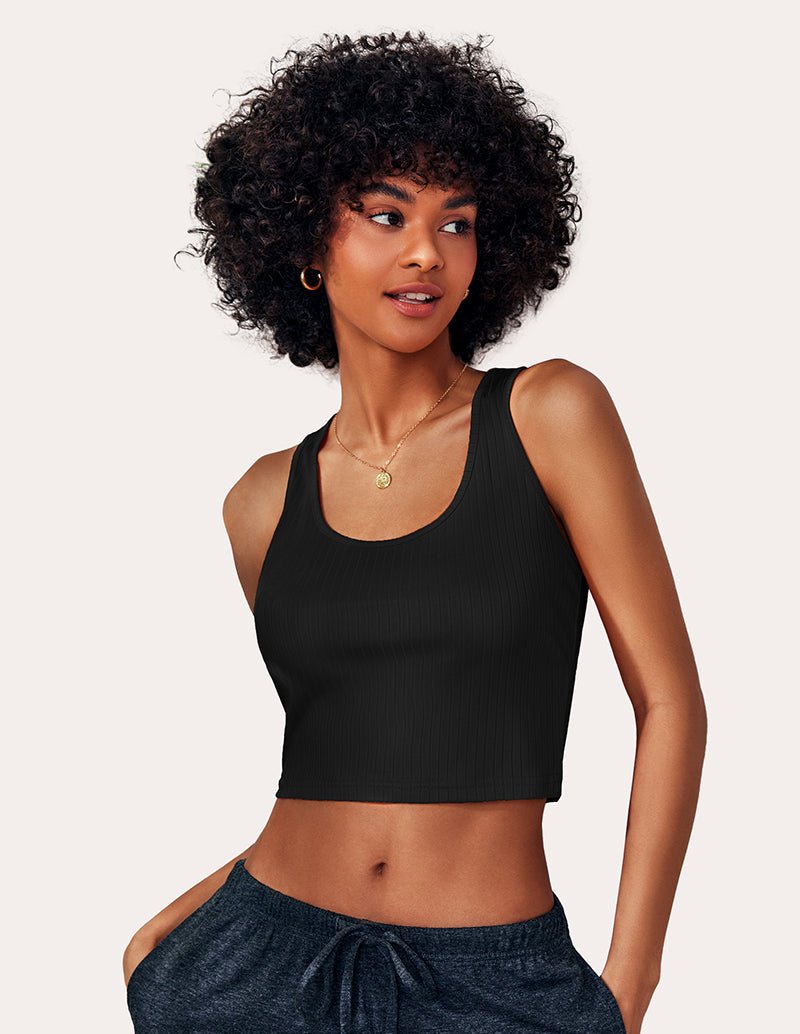 Black ribbed tank top close-up with scoop neck and wide straps.