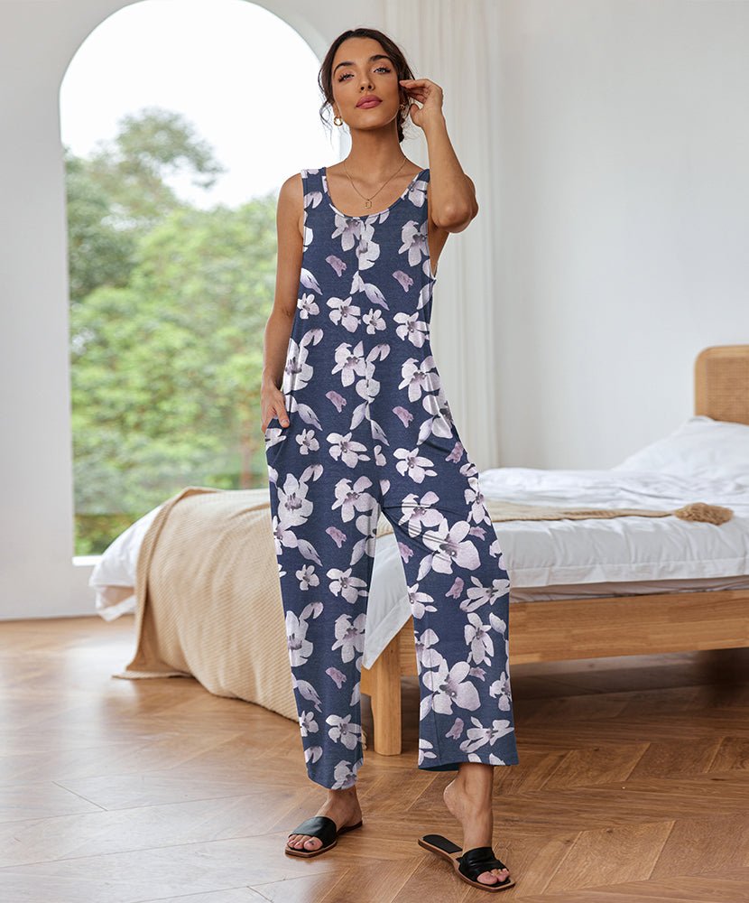 Blue floral sleeveless loose jumpsuit with scoop neck and wide legs