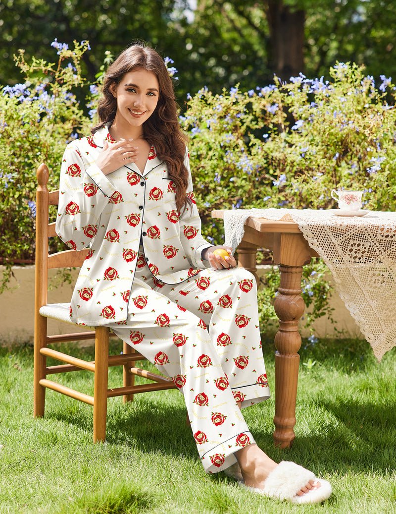 Satin pajama set in white with red print, long-sleeve button shirt and long pants