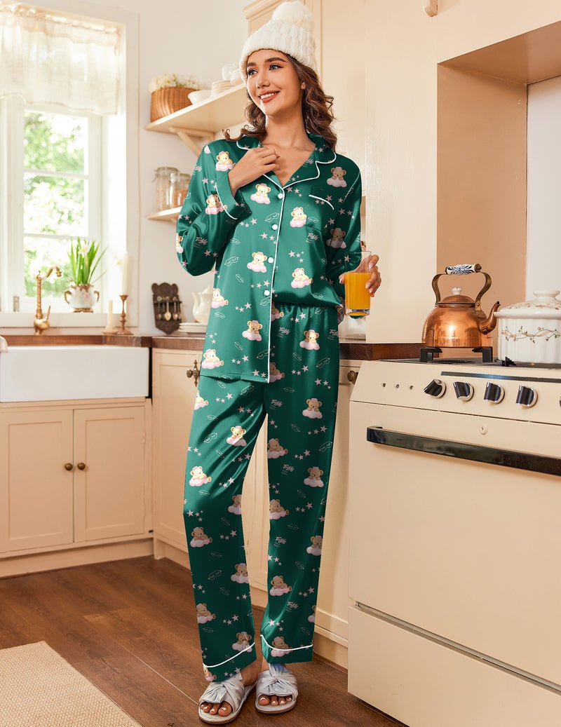 Green satin pajama set with button-front shirt and allover cartoon print pants