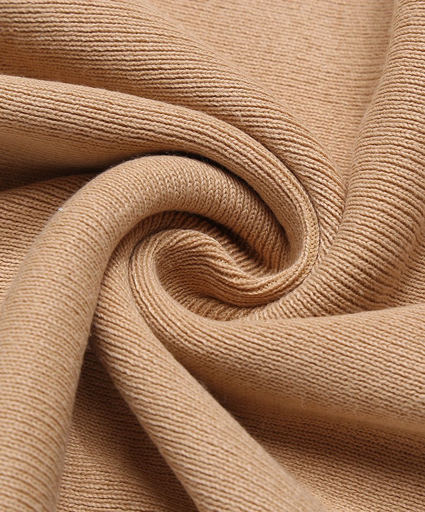 Caramel knit fabric close-up with soft ribbed texture