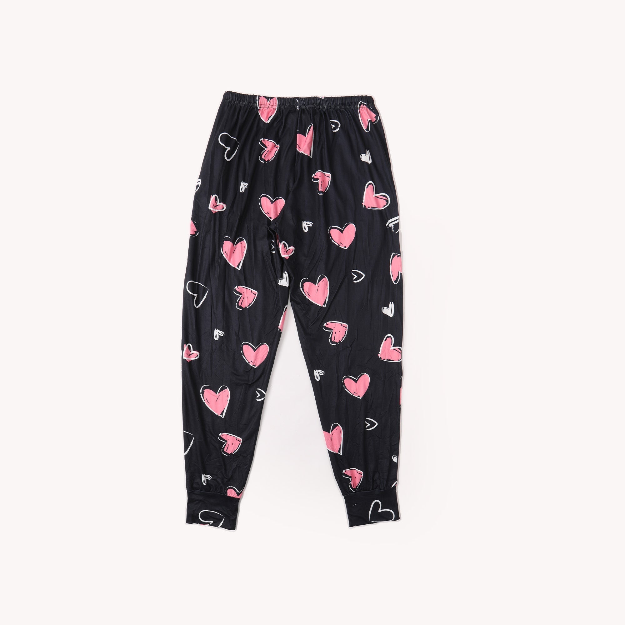 Black heart-printed pants with elastic waist and pink heart allover pattern