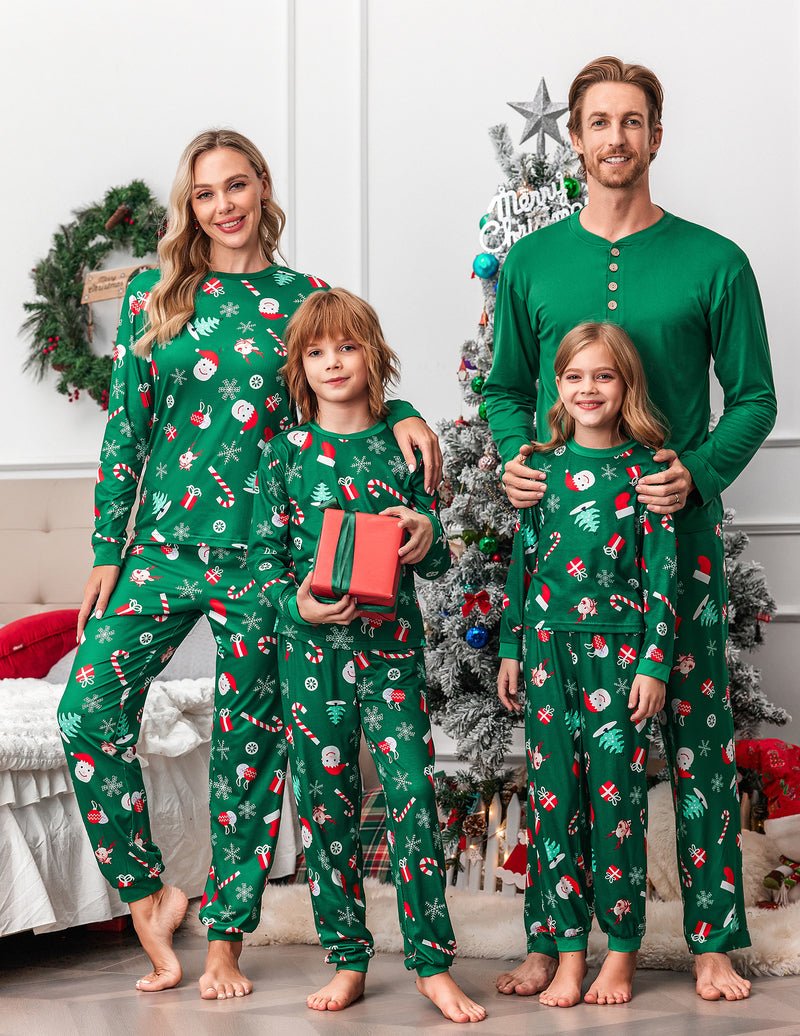 Matching family Christmas pajama set, green fabric with playful holiday motif print