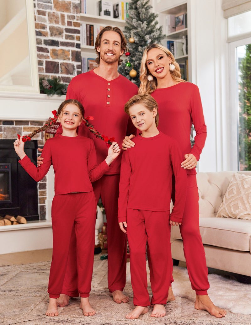 Family matching Christmas pajamas: solid red tops with red pants (3-piece look)
