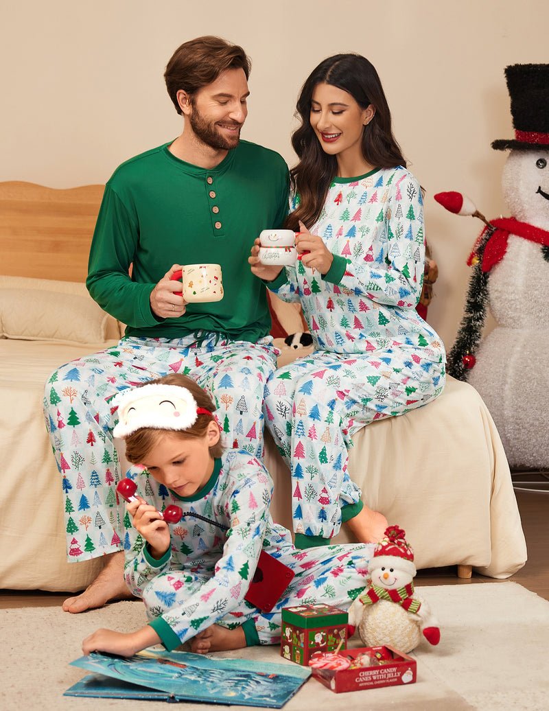 Family Christmas pajamas: green long-sleeve top and white tree print pants