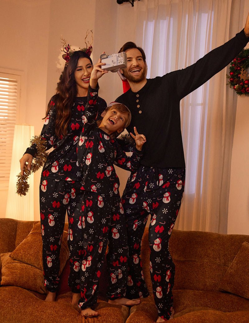 Black Christmas pajama set for women and kids, snowman and bow print, long-sleeve top