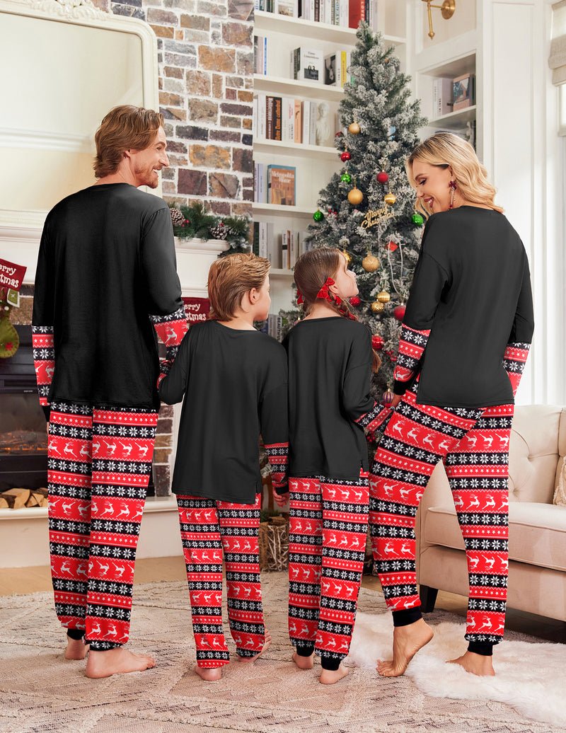 Back view: black matching pajamas with red-and-white patterned pants for family set