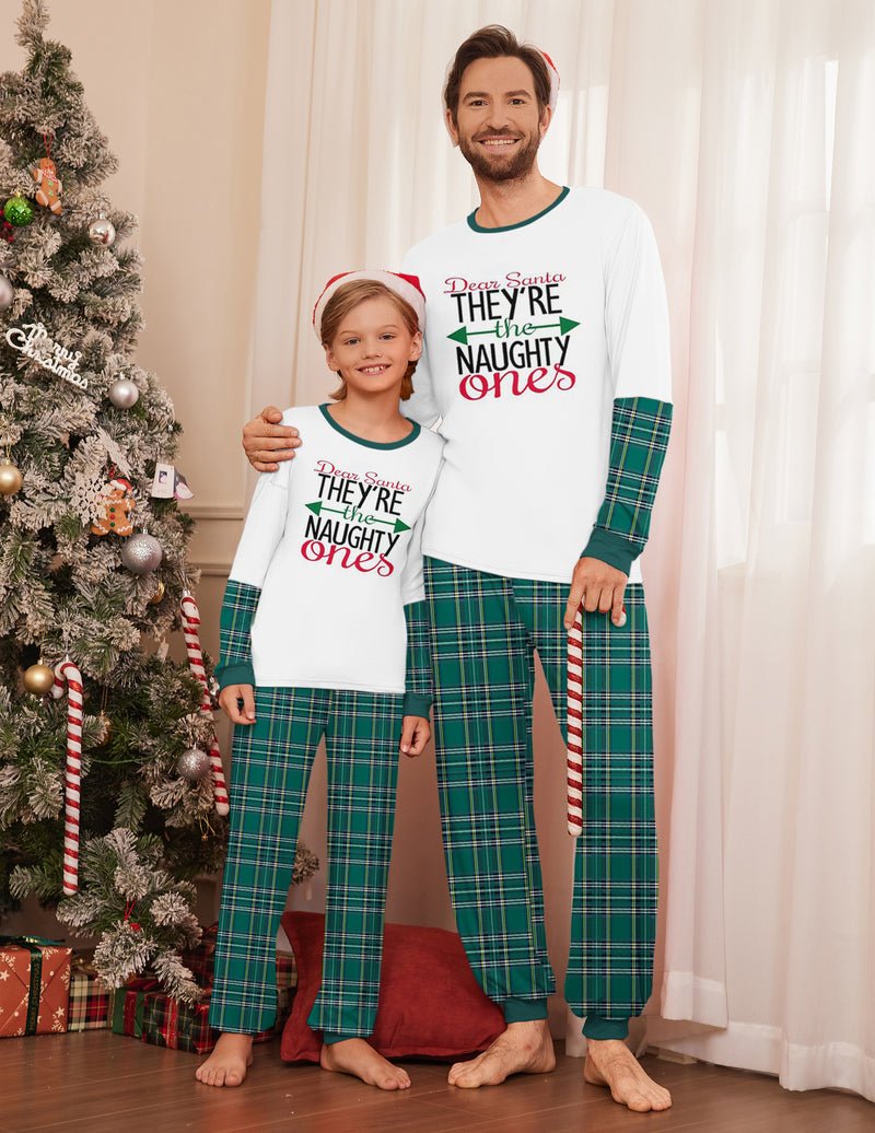White top with “They’re the Naughty Ones” text and green plaid pants, women matching set