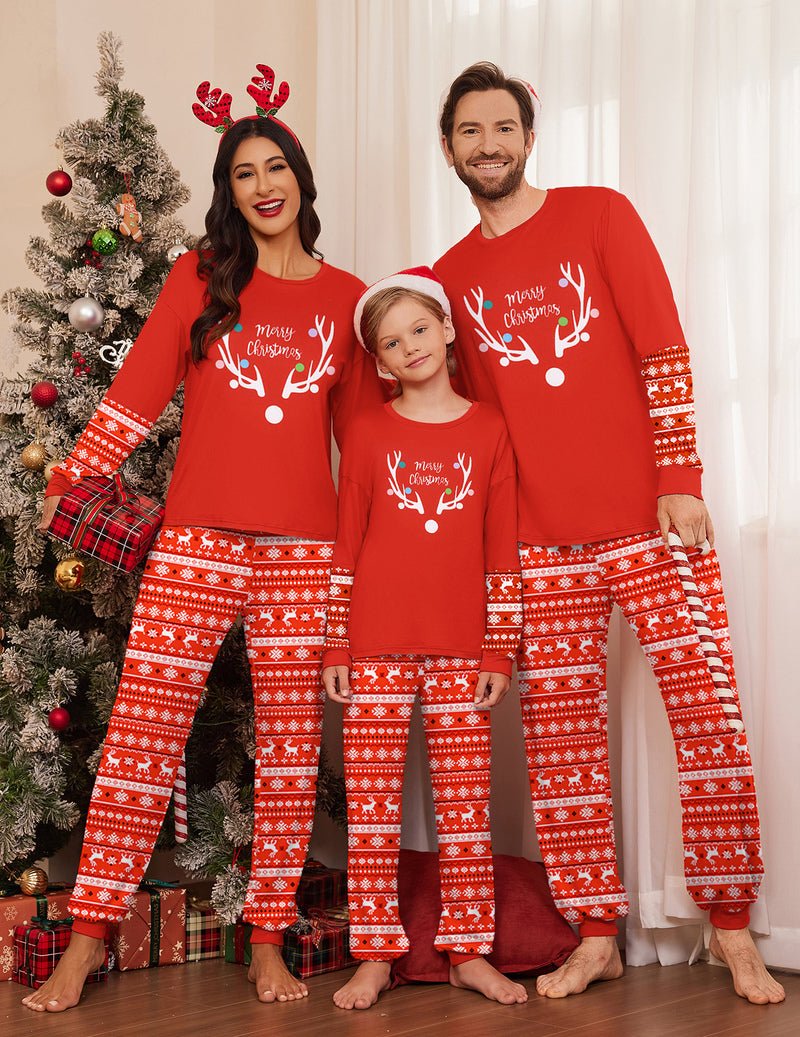Red pajama set with reindeer motifs and “Merry Christmas” lettering, family matching