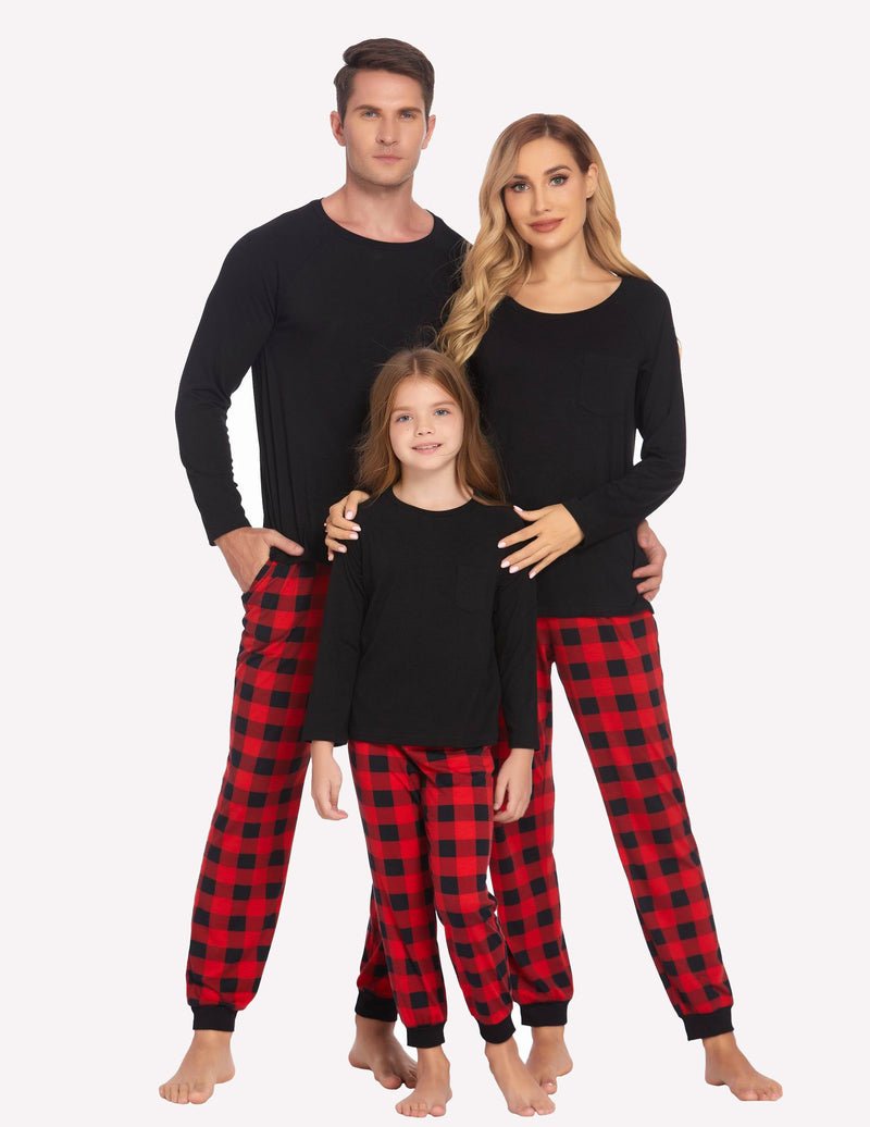 Black long-sleeve family pajama set with red plaid pants for men, women, and kids